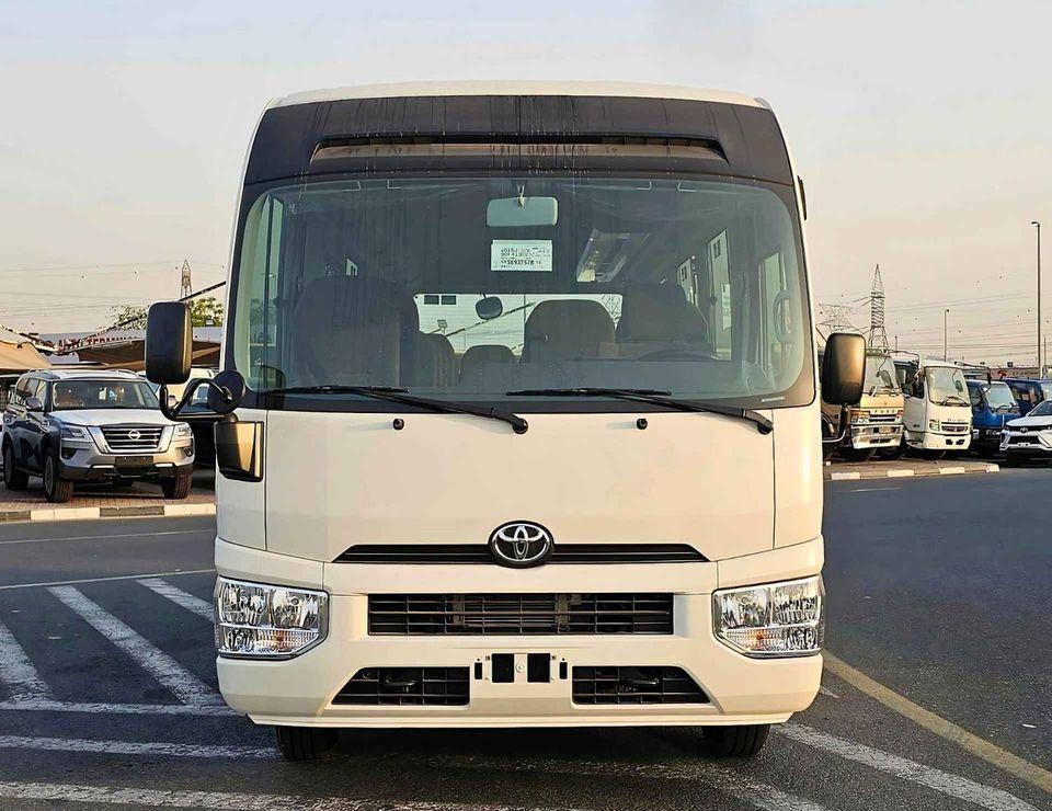 Toyota Coaster 4.0L V4 DIESEL / 23 STR M/T / AUTO DOOR / BAGGAGE TRAY WITH RACK (CODE # COD4J)