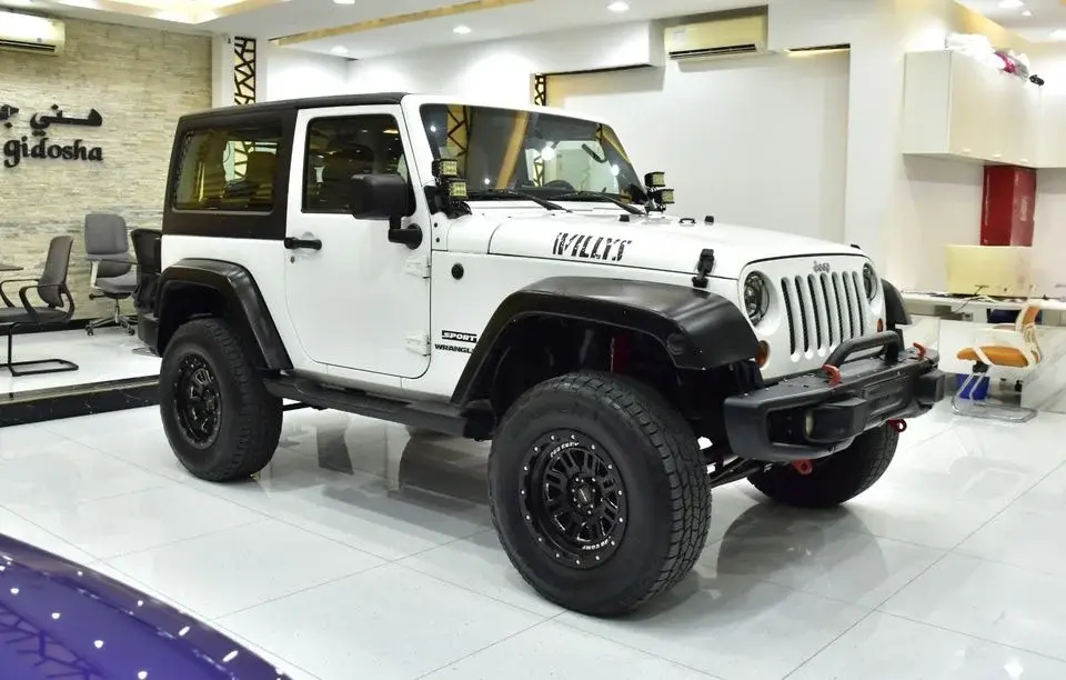 Jeep Wrangler EXCELLENT DEAL for our Jeep Wrangler Sport ( 2012 Model ) in White Color GCC Specs