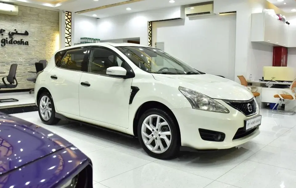 Nissan Tiida EXCELLENT DEAL for our Nissan Tiida SL 1.8L ( 2016 Model ) in White Color GCC Specs