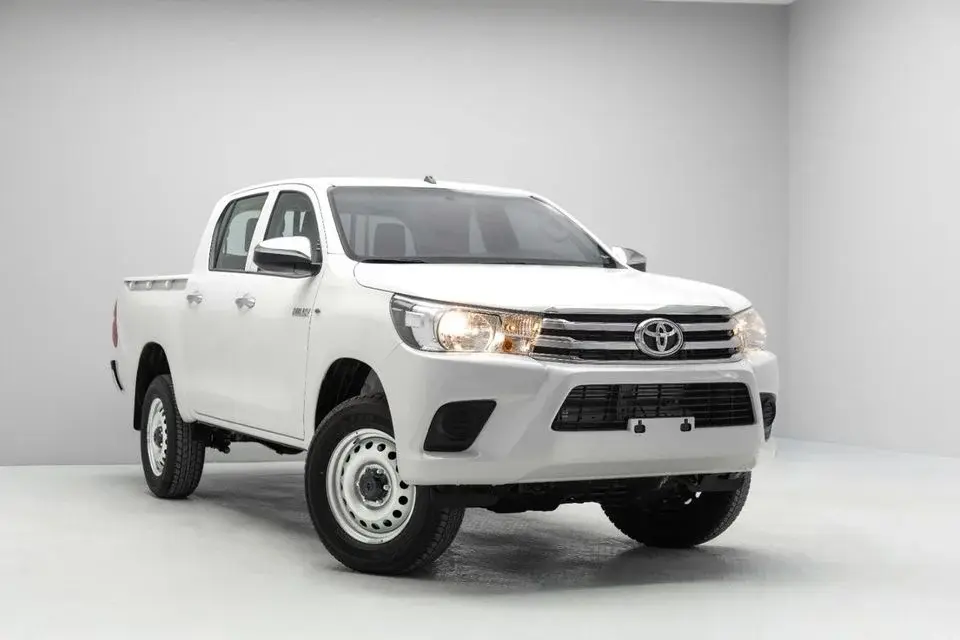 Toyota Hilux DLX 2.4L - Super White Inside Maroon Export Only